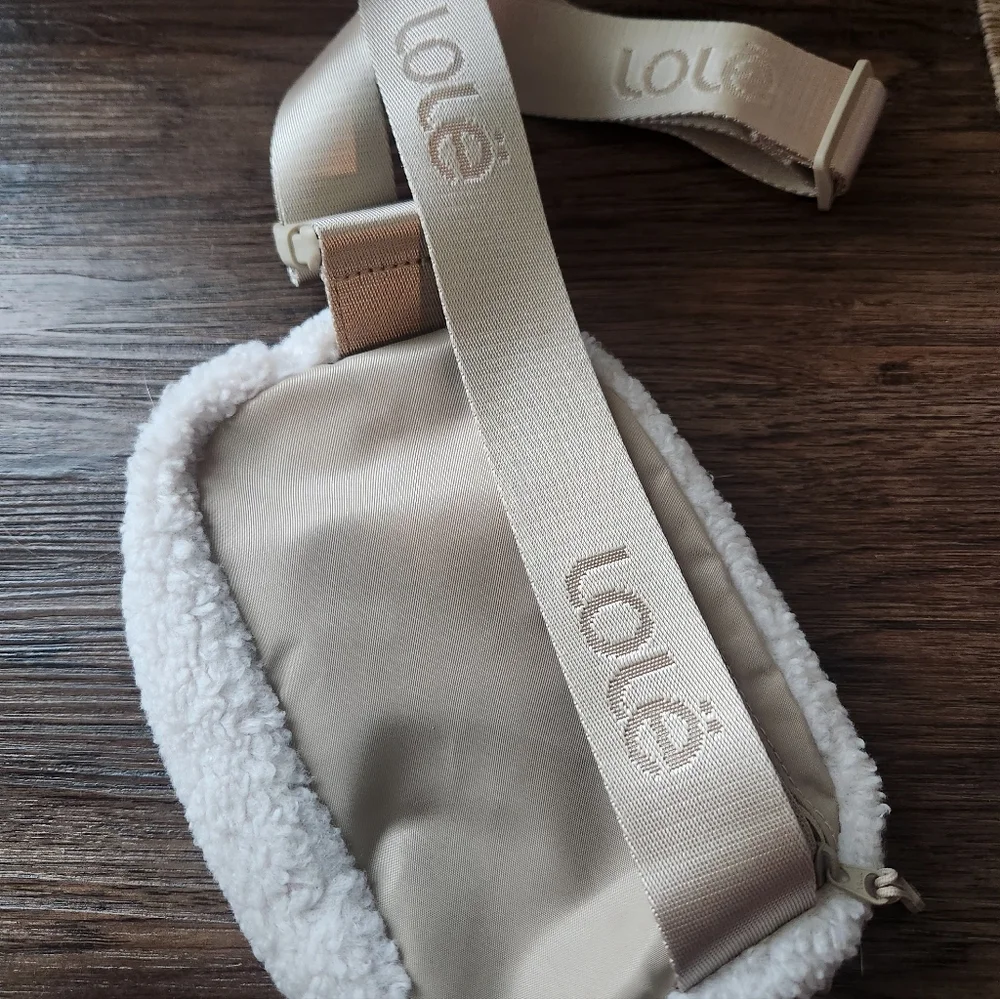 Lole Cream Sherpa Crossbody Belt Bag with Embossed Strap